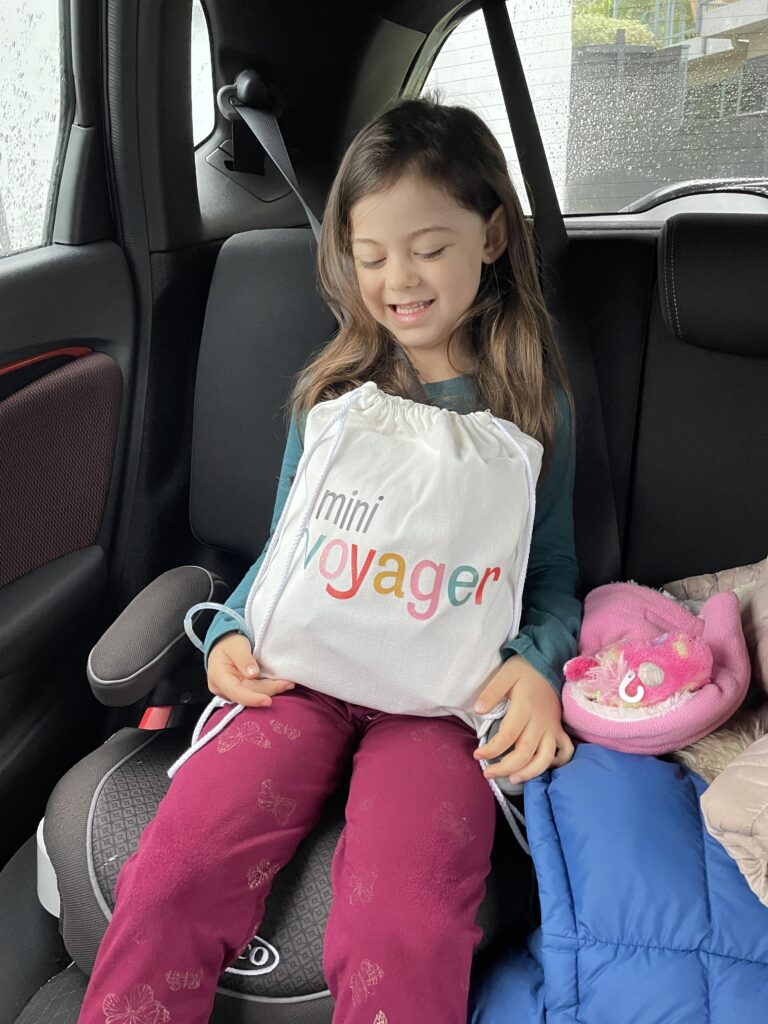 Elena with her mini voyager travel activity kit