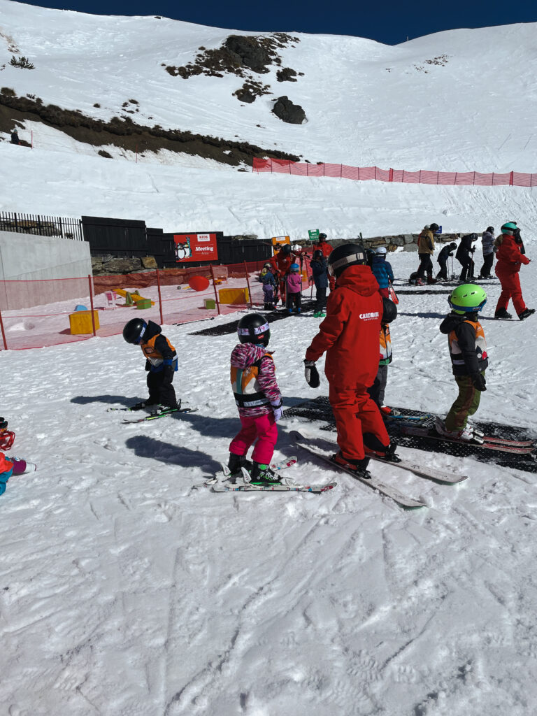 little girl learning how to ski at cardrona alpine resort youth group lessons program