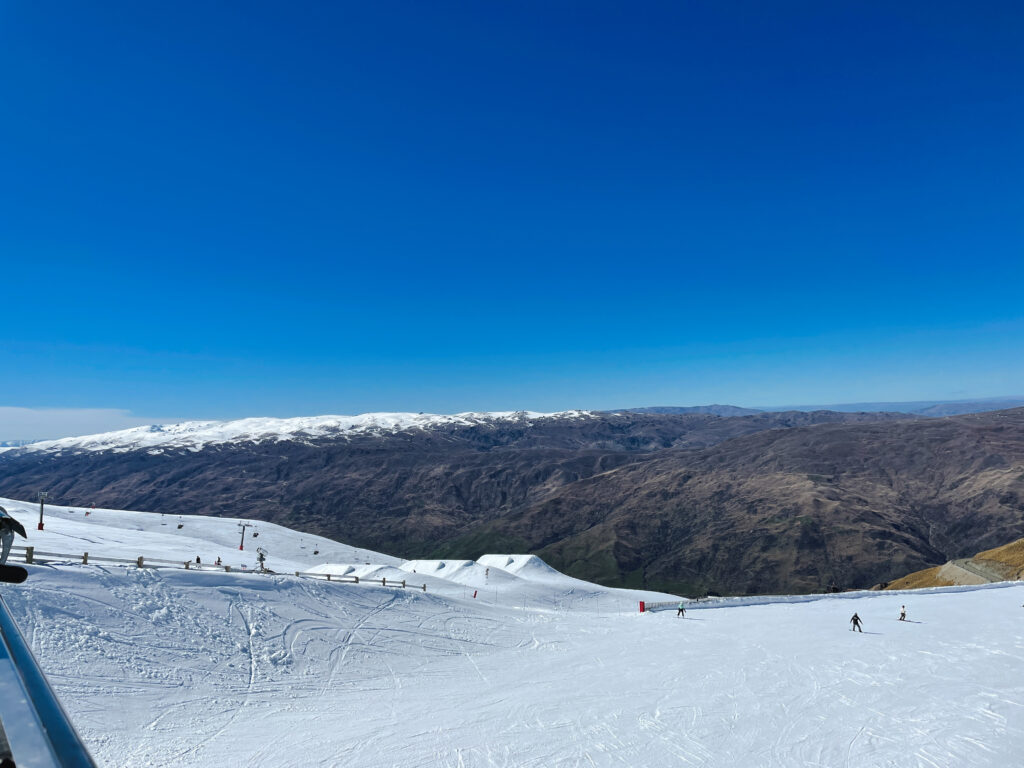 cardrona ski field during the daytime with snow covered mountains in the background