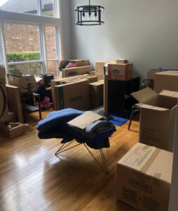 Room full of boxes while preparing for our international shipping container to arrive. 