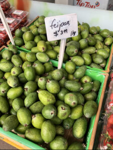 container full of feijoa fruit at the supermarket