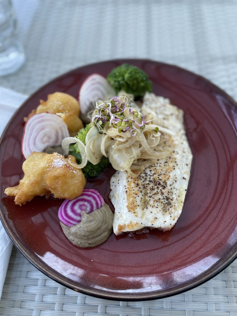 plate of cooked fish from Awaroa lodge restaurant